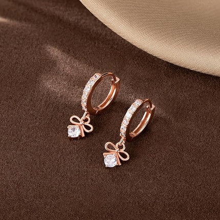 SLUYNZ Sterling Silver CZ Bowknot Hoop Earrings for Women Teens Small Bow Hoop Earrings Huggie Drop